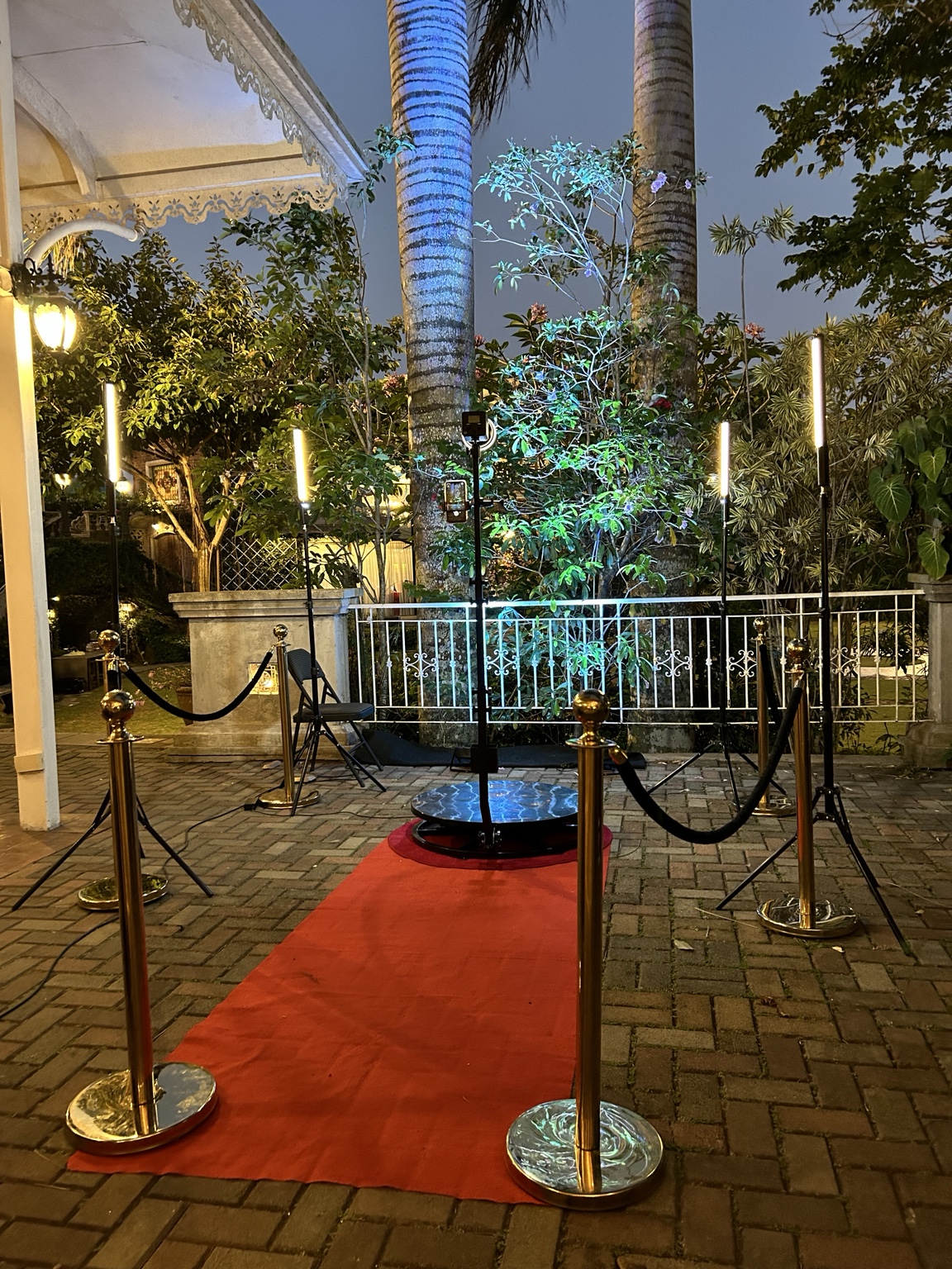 Outdoor 360 video booth setup with red carpet